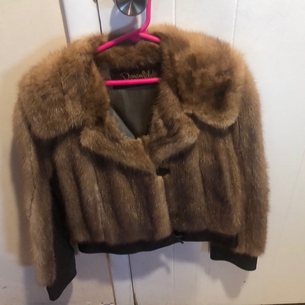 Fox fur trimmed in leather